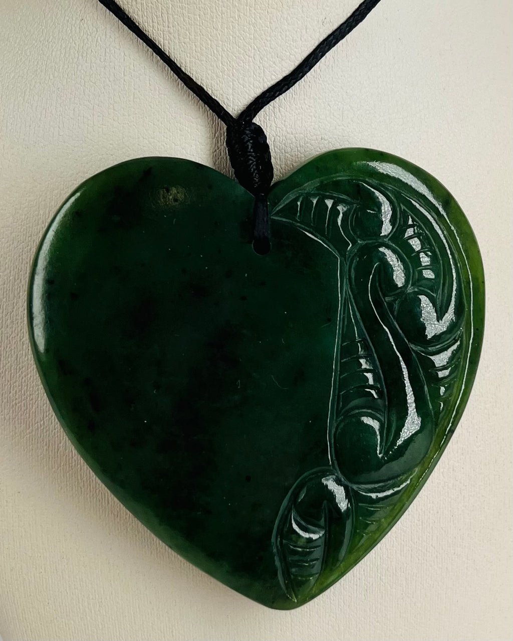 Green stone on sale heart necklace